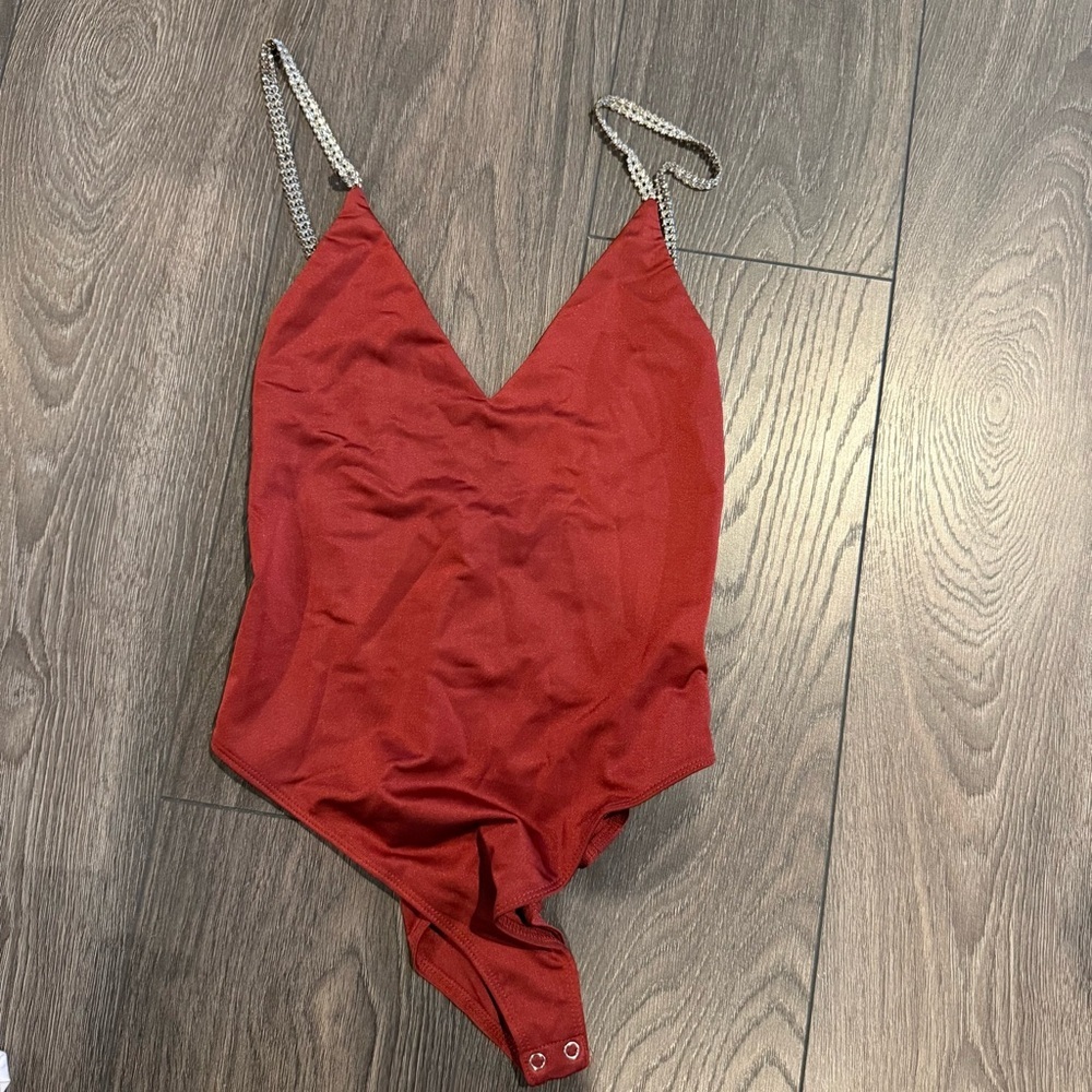 Forever 21 Burgundy bodysuit with rhinestone strap